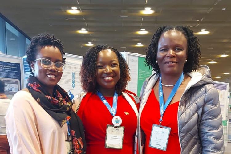 Dr. Lauryn M. Busolo (middle) & Dr. Lydia Okutoyi (KNH) (left in red) at the 7th Global Symposium 2022