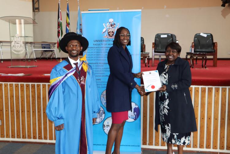 Photo Right: The Dean for FHS - Prof. Osanjo, Dr. Millicent Masinde and H.O.D for Obs/Gyn - Prof. E. J.  Cheserem